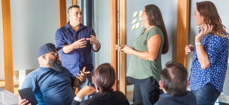 A group of people taking part in a workshop run by the Ka Hao: Māori Digital Technology Development Fund
